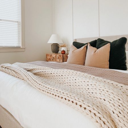 Our fall master bedroom inspired with our white comforter, knitted blanket, brown quilt and throw pillows. We love keeping a neutral bedroom, but adding a little season touch to it  

#LTKSeasonal #LTKhome #LTKHalloween