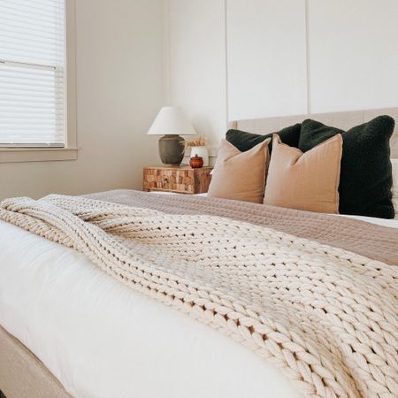Our fall master bedroom inspired with our white comforter, knitted blanket, brown quilt and throw pillows. We love keeping a neutral bedroom, but adding a little season touch to it  

#LTKSeasonal #LTKhome #LTKHalloween
