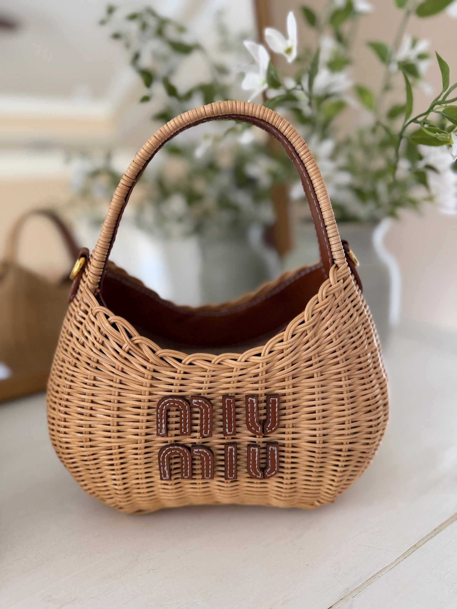 Miu Miu wicker Summer bag! Investment but so adorable 

#LTKSeasonal #LTKTravel #LTKspringtrends
