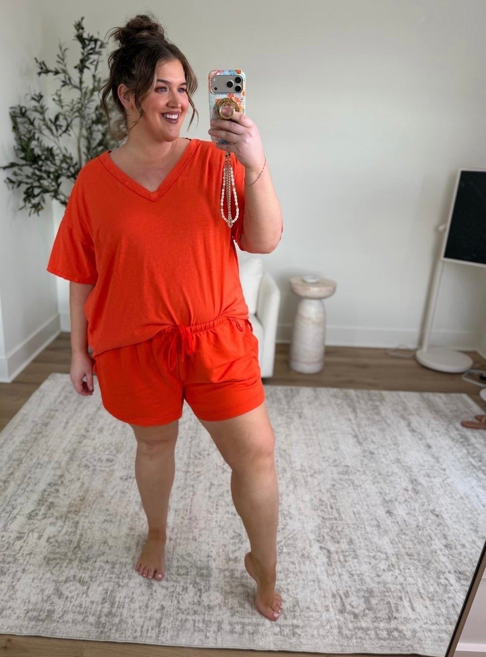I cannot get enough of this gorgeous firey orange 🔥 🍊 for summer. It’s absolutely gorgeous and the color just pops. I’m especially loving it with this monochromatic lounge outfit from @Aerie. You know it’s going to be incredible comfortable, and great quality if it’s from there! I loved this for lounging around, and running errands, but it can absolutely be dressed up for a lunch in this scorching 🥵 summer heat.  I’m wearing a size XL in the top, and bottom. 
Lounge outfit inspo, monochromatic red outfit, plus size lounge set

#LTKPlusSize #LTKSaleAlert #LTKSeasonal