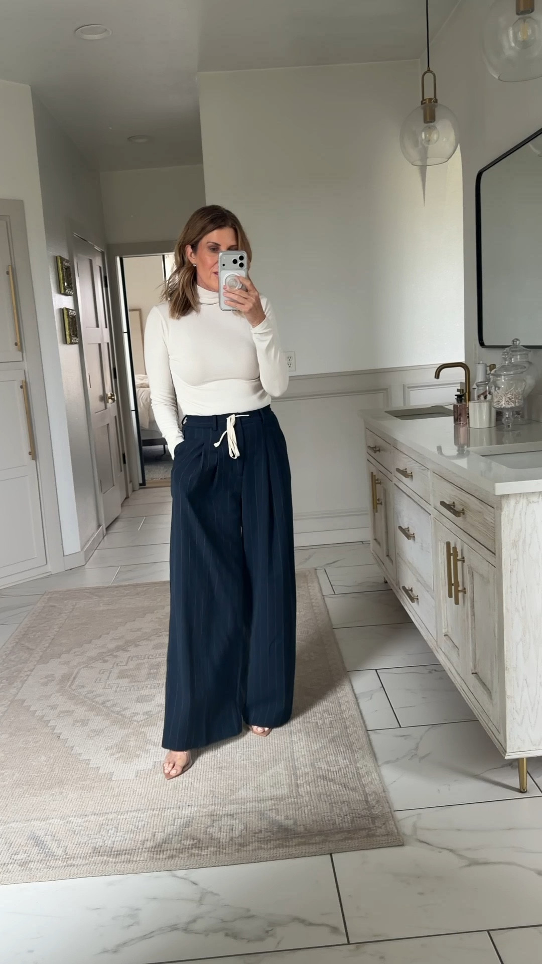 Wearing a small regular length in the Avery pleated trousers 

#LTKOver40 #LTKSpringSale