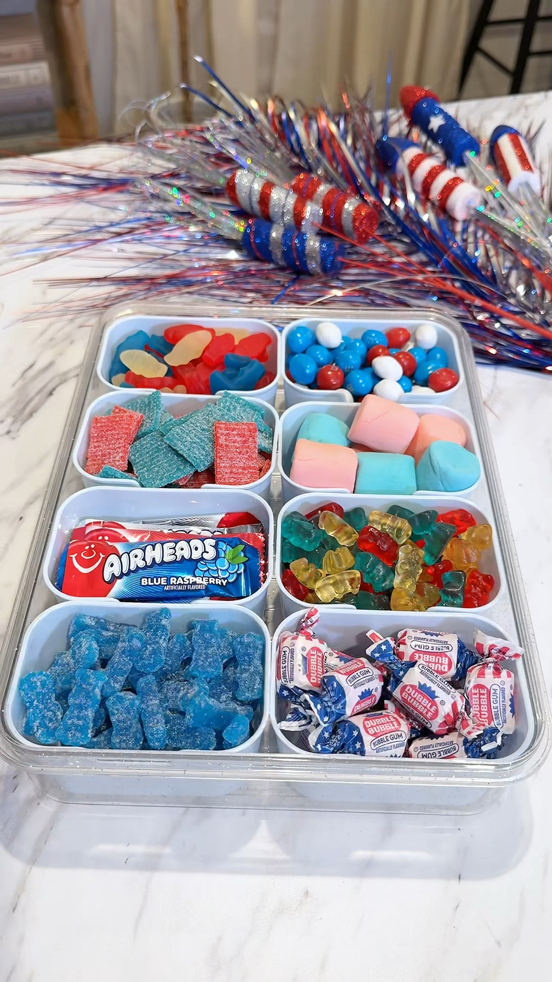 Serving sugar and stars this Fourth of July with the snackle candy box no one asked for, but everyone needed today! 🇺🇸🍭❤️✨🎇🧨🧢🍫⭐️

#LTKHome #LTKSeasonal #LTKParties