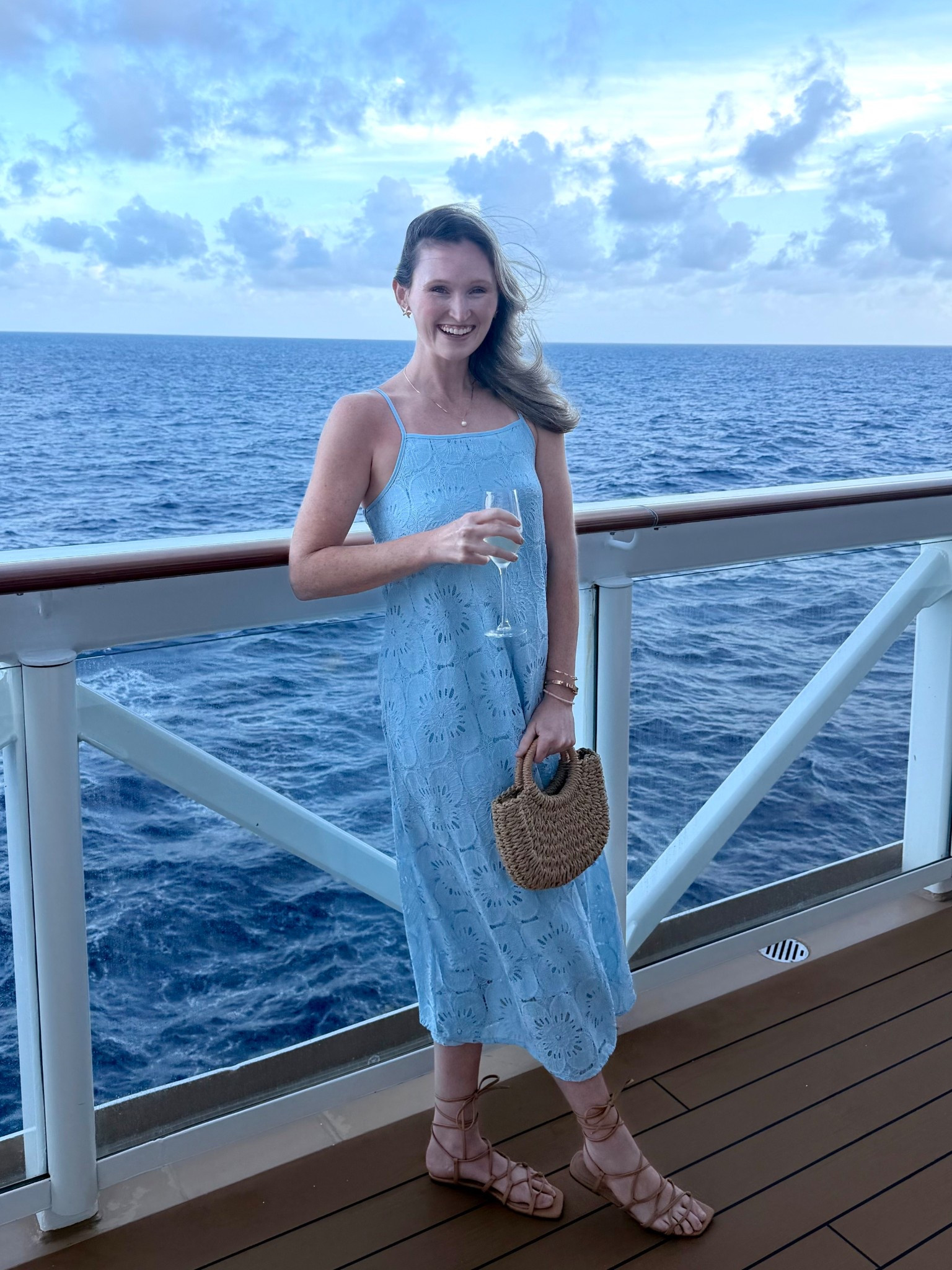 Tall girl friendly light blue maxi dress with flower details. Beach, vacation, cruise, Easter outfit. Straw bag with starfish gold earrings and lace up sandals 

#LTKTall #LTKTravel #LTKspring