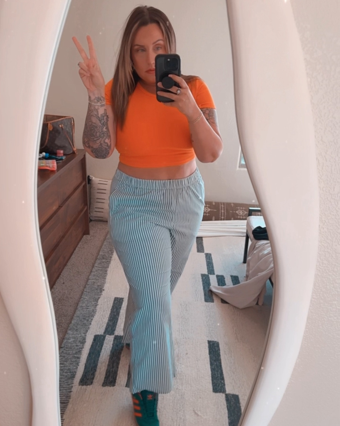 Love these pants! And a good dupe designer bag  

#LTKFindsUnder50 #LTKMidsize