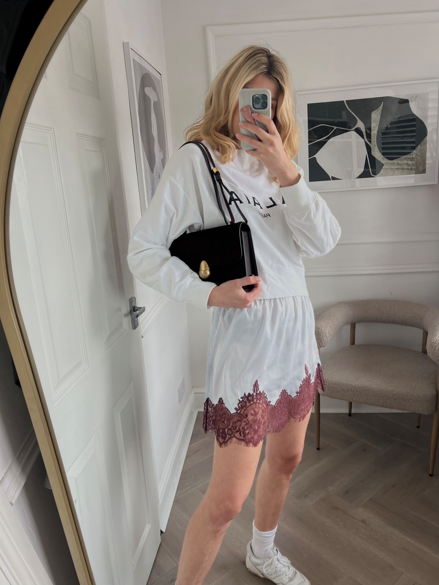 Alaia sweatshirt, slip skirt, white sweatshirt, new balance trainers, 550 new balance, new balance trainers, neous bag, burgundy bag 

#LTKspring #LTKstyletip #LTKeurope