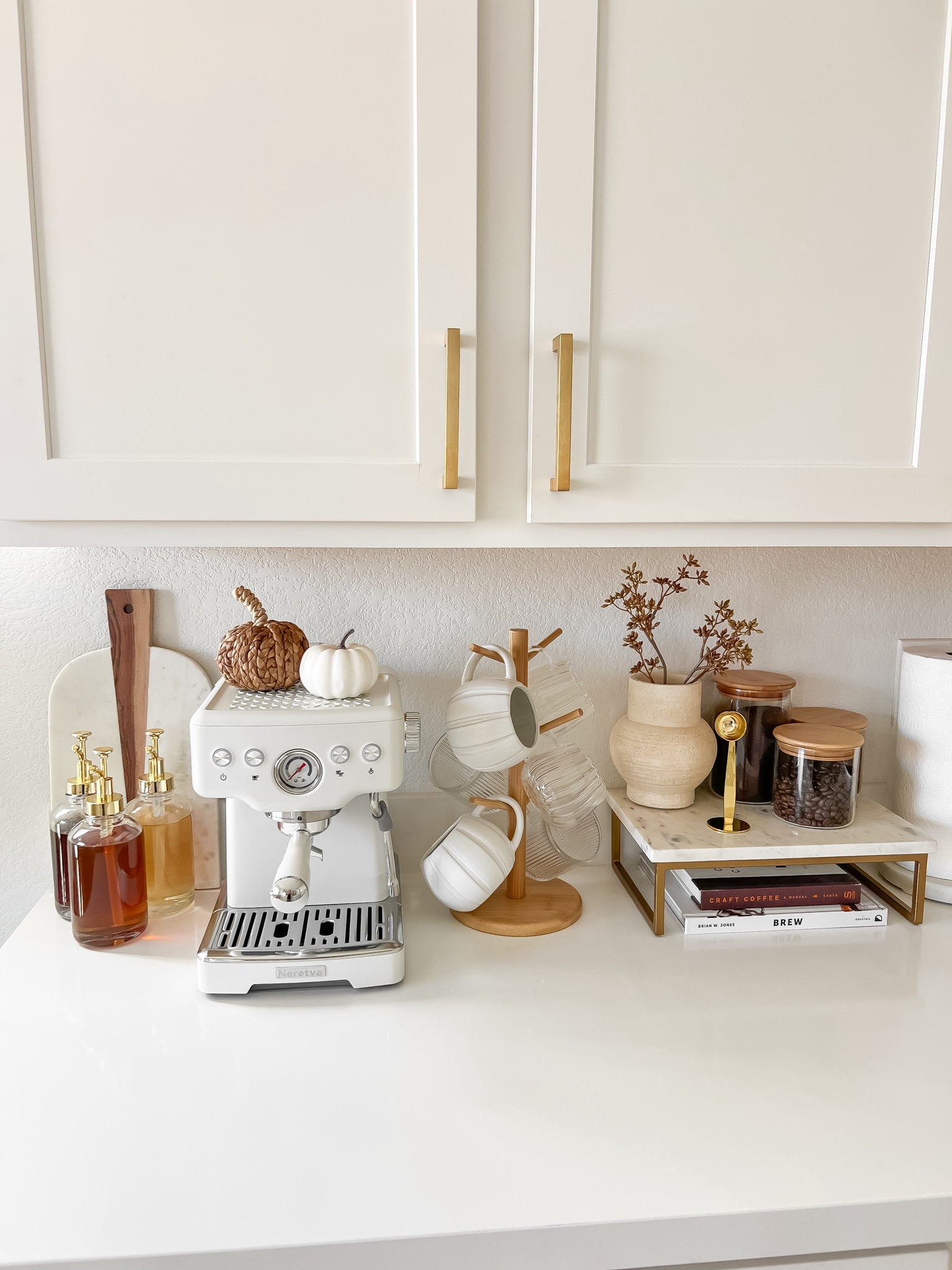 Fall coffee bar decor | fall coffee bar decor ideas, fall coffee bar styling, coffee bar fall decor, how to style coffee bar for fall, fall coffee bar ideas, fall coffee bar styling, fall coffee station decor, fall decorations, gold glass syrup dispensers, bamboo glass storage containers, pumpkin mugs, white espresso machine, white espresso maker, Amazon coffee table books, neutral home decor, neutral kitchen decor, Amazon home, Target home

#liketkit #LTKSaleAlert #LTKFindsUnder50 #LTKSeasonal #LTKStyleTip #LTKHome #LTKFindsUnder100