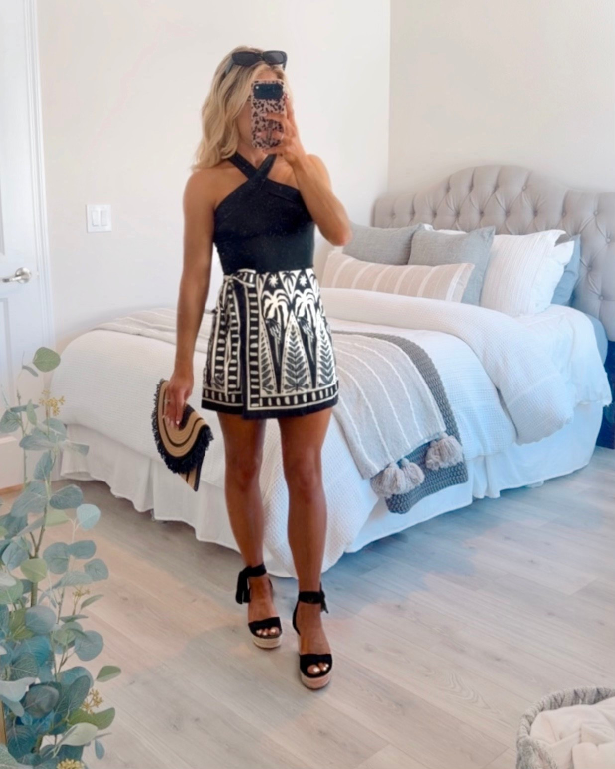 Trendy Vacation Outfit or Resortwear look from Amazon styled with a tropical wrap mini skirt, criss-cross halter top, matching black wedges, + a straw clutch.

Resort outfit, resort wear, tropical outfit, beach outfit, vacation skirt, resort skirt 

#LTKootd #LTKTravel #LTKSaleAlert