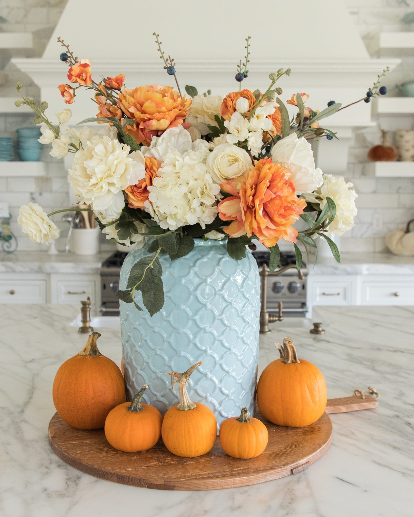My most popular fall flower arrangement ever! It’s also my most stolen photo! Guess everyone still loves the light blue and orange color combo!  

#LTKSeasonal #LTKHome #LTKHalloween