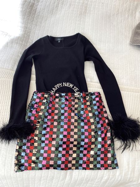 Fun festive winter outfit idea with a fun sequin mini skirt! 

#LTKSeasonal #LTKunder100 #LTKstyletip