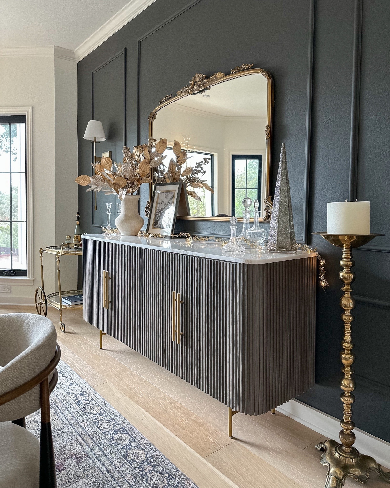 Dining room sideboard holiday decor ✨

Fluted buffet, console, Amelie mirror gold, Target holiday decor 

#LTKhome #LTKstyletip #LTKHoliday