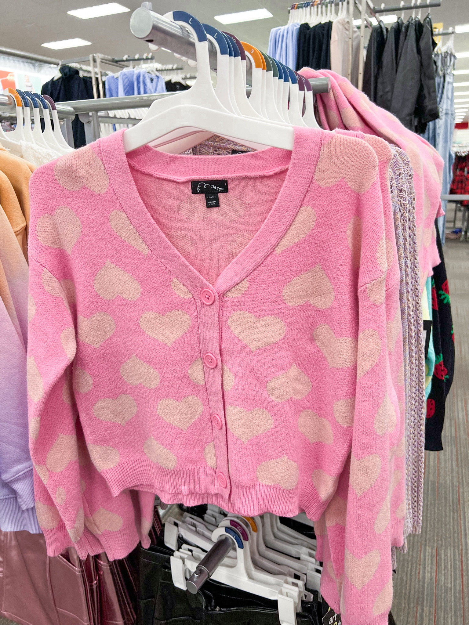 The cutest Target heart cardigan for girls! 🫶🏼 We sized up to a medium for Brynn. Loved loved loved the material - super soft! 

#LTKkids #LTKfamily #LTKMostLoved