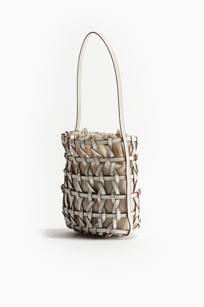 Intertwined-strap bucket bag - White - Ladies | H&M GB | H&M (UK, MY, IN, SG, PH, TW, HK)