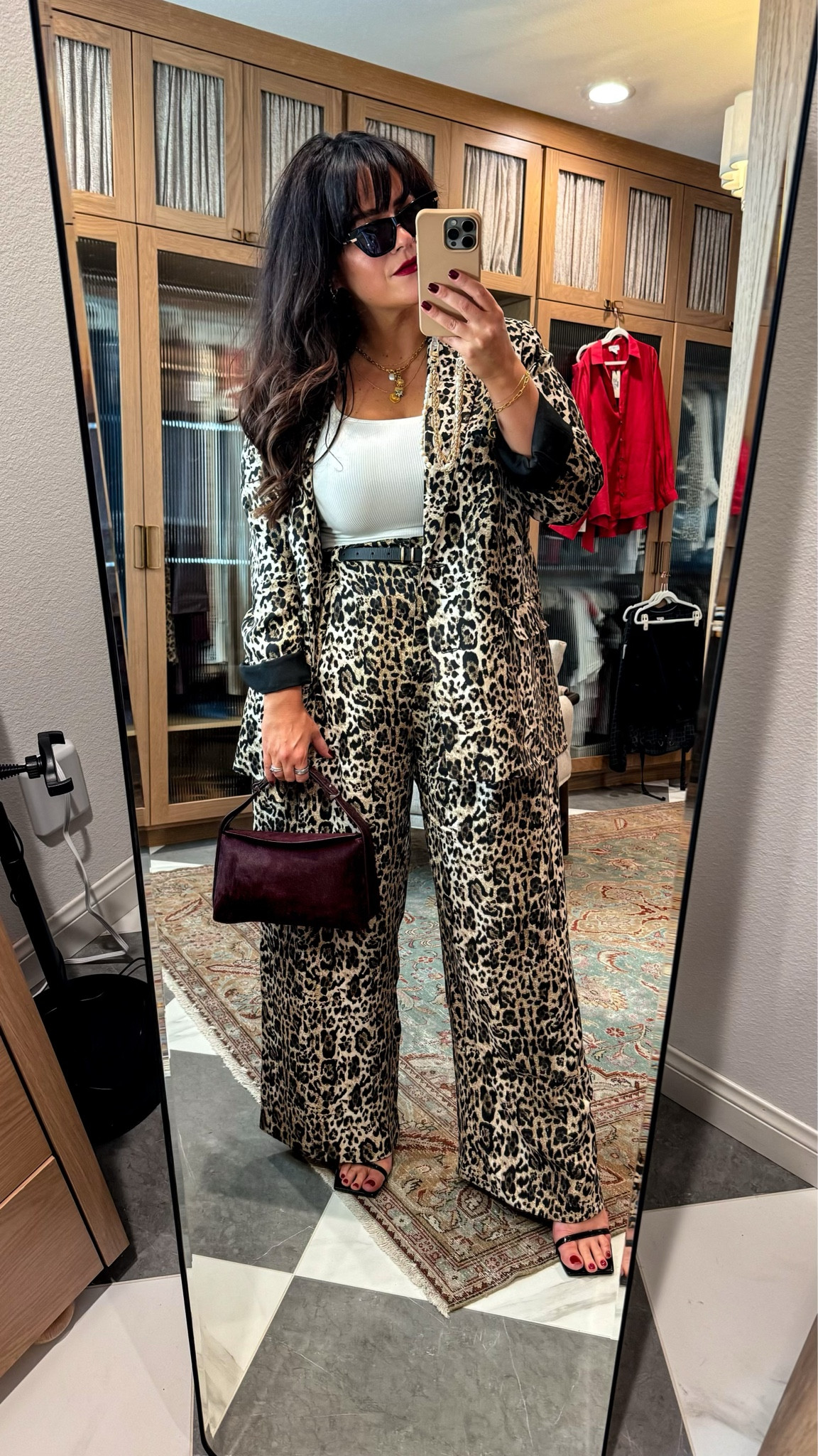 Midsize leopard suit 
Sized down one in the blazer runs oversized 
Pants are tts 
Belt xl 
Wedge sandals sized up a 1/2 size 
Burgundy bag is from Zara 
Frosting will be available on 9/19

#LTKMidsize #LTKWorkwear #LTKCon