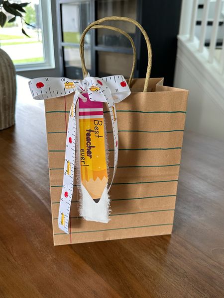 Teacher gift idea for teacher appreciation week! The pencil gift tag I made and is linked in my bio on my IG profile: @amyadler_