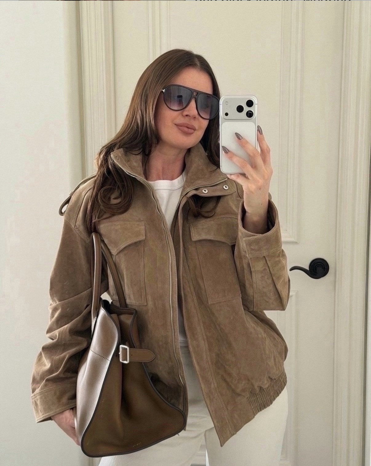 Styling this viral @Zara jacket with white denim and black loafers. Wearing size S. Found a similar one on amazon! (Tagged below)
#zara #suede #brown #jacket #bomber #amazonfashion 

#LTKWorkwear #LTKgrwm #LTKootd