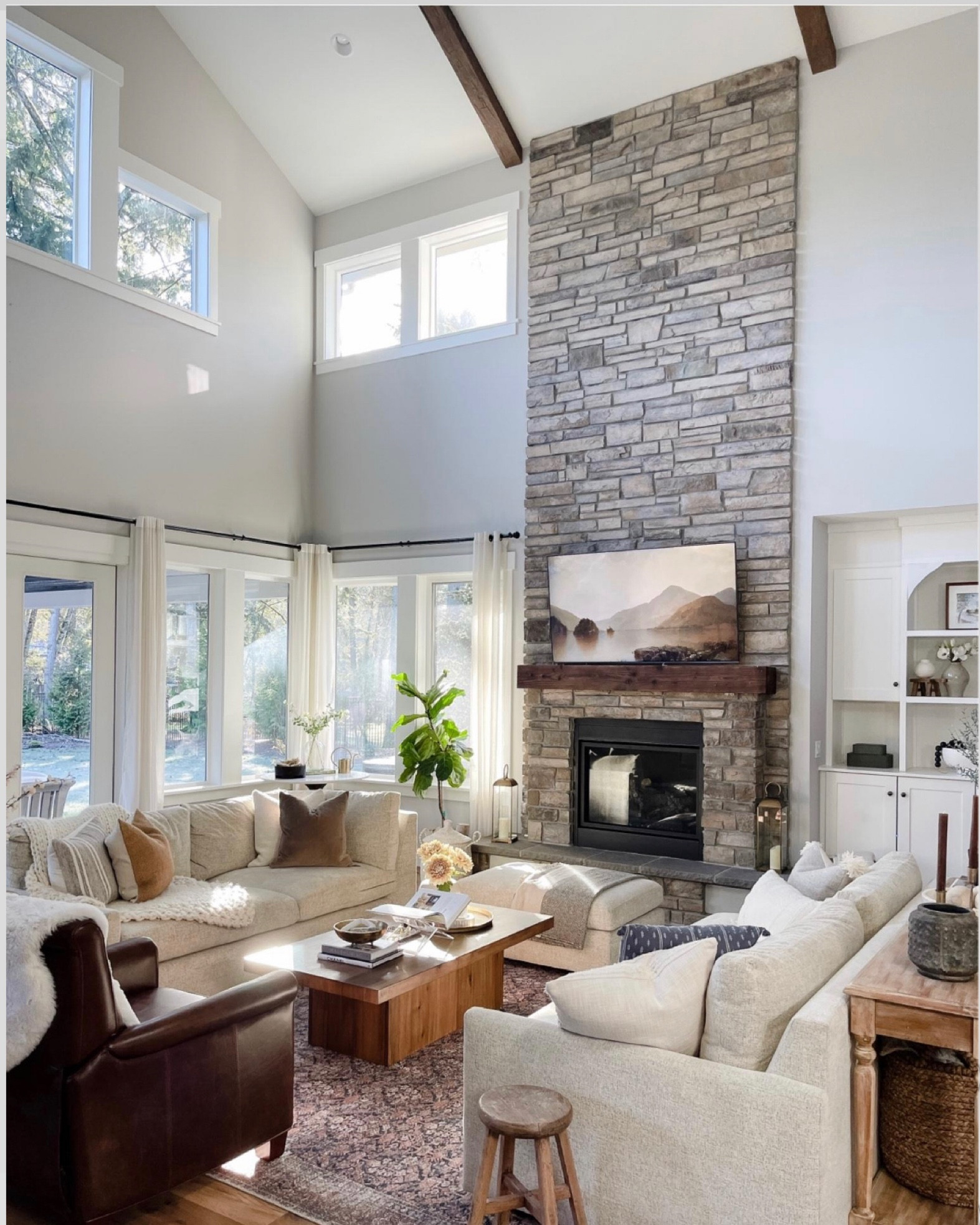 Living room summer light. Open concept living room decor. 

Coffee table, sectional, arm chair pottery barn, arhaus, spring stems 

#LTKSeasonal #LTKstyletip #LTKhome