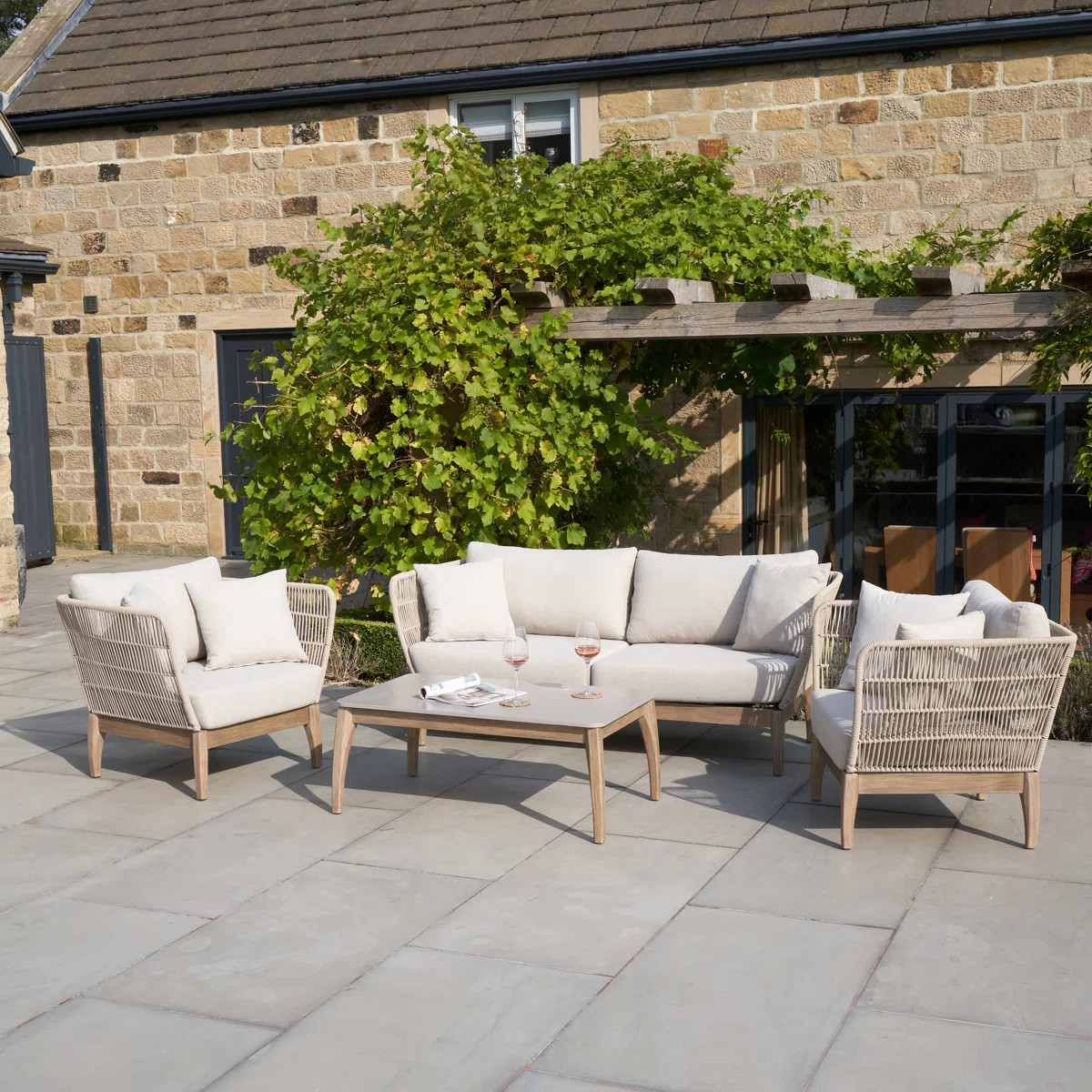 Geraldo Wicker 4 - Person Garden Lounge Set with Cushions | Wayfair UK