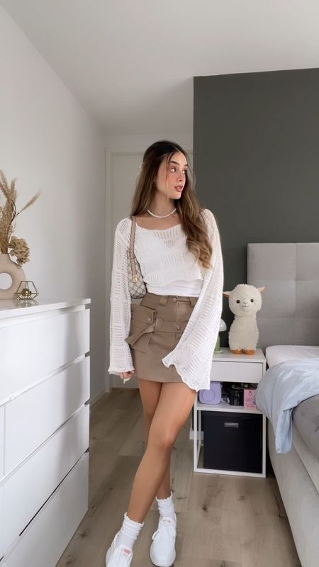 Spring Outfit Inspo🌸

White designer cami, khaki cargo skirt, chunky white sneakers, mesh spring long sleeve top, Allover Letter Graphic Flap Bag Shoulder Bag Vintage,Casual Portable,Lightweight For Women, Rookies & White-Collar Workers,For Girl,For Woman Gift Bag,Perfect For Office,Work ,Business,Commute, 

#LTKVideo #LTKSeasonal #LTKstyletip