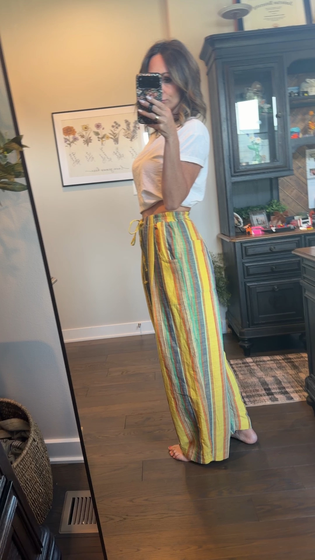These pants are amazing and linen and delightful. Fun pattern, run true to size, these are an extra small. Drawstring that functions at the ways, deep pockets, and all the good free people vibes you can imagine from these. So many compliments every time I wear them. They are just such a perfect spring and summer staple with a good little tank or crop shirt.

#LTKSeasonal #LTKOver40 #LTKmomlife
