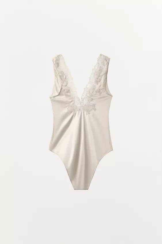 ZARA WOMAN COLLECTIONSatin bodysuit with a v-neckline and sleeveless design. Featuring matching l... | Zara UK
