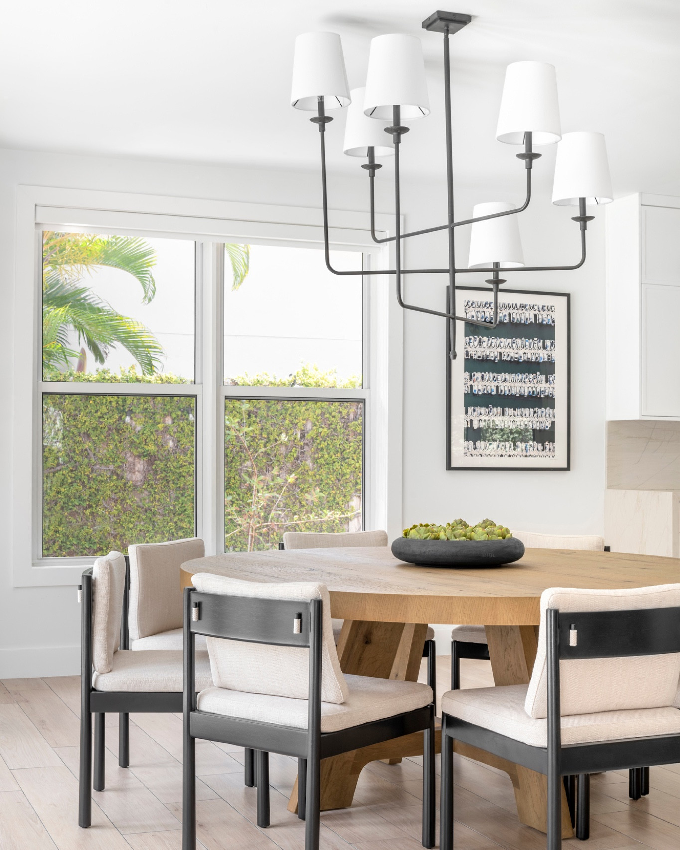 North Miami Elevated New Traditional - We blended traditional elegance with contemporary elements in the dining room, family room, and living room of this North Miami family home. This classic and timeless design with a fresh twist is what we call new traditional interior design. #westelmhome #cb2 #crateandbarrel 

#LTKfamily #LTKhome