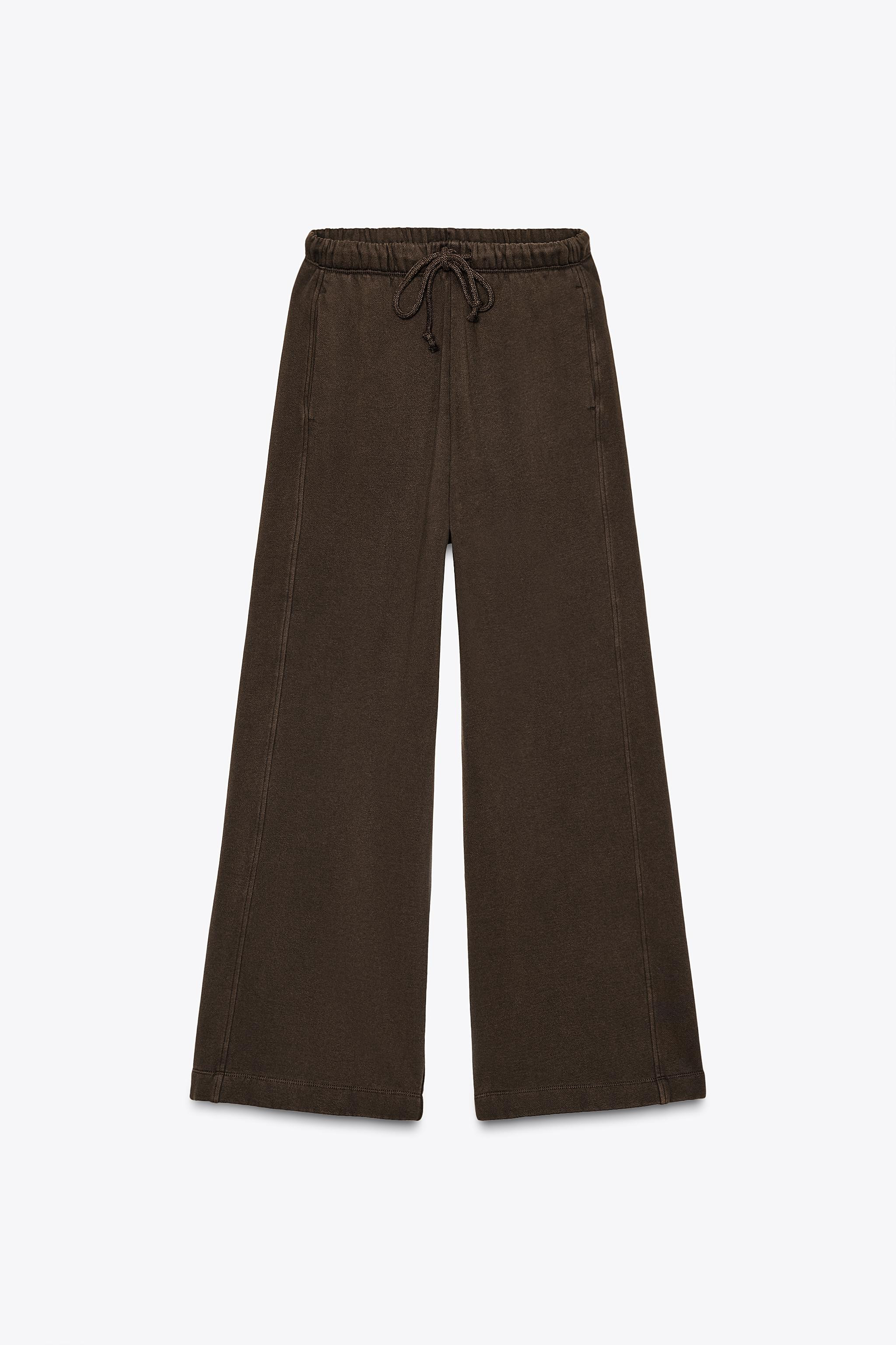 Mid-waist trousers in a cotton-rich yarn. Elasticated waistband with adjustable drawstrings. Side... | Zara UK