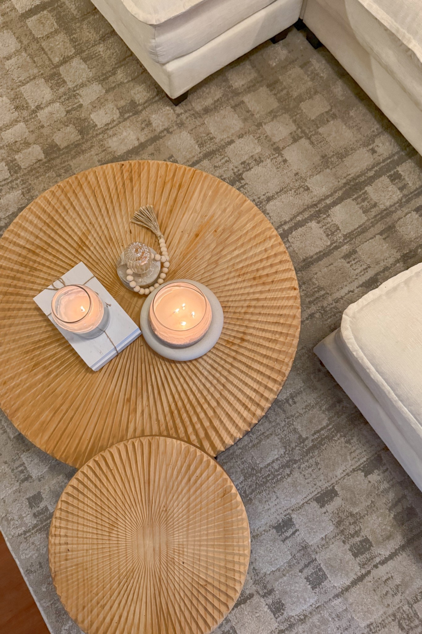 coffee table tray styling, sofa tray decor, minimalist styling, shelf styling decor, neutral vase decor, greenery indoors, faux olive tree, decorative candles, glass hurricane candle holders