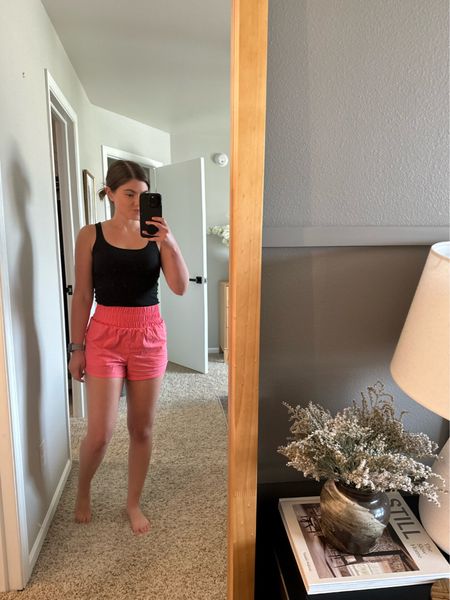Casual summer outfit from target, running shorts with pockets, high waisted shorts, black tank top, easy outfit, pink shorts 

#LTKstyletip #LTKfit #LTKFind