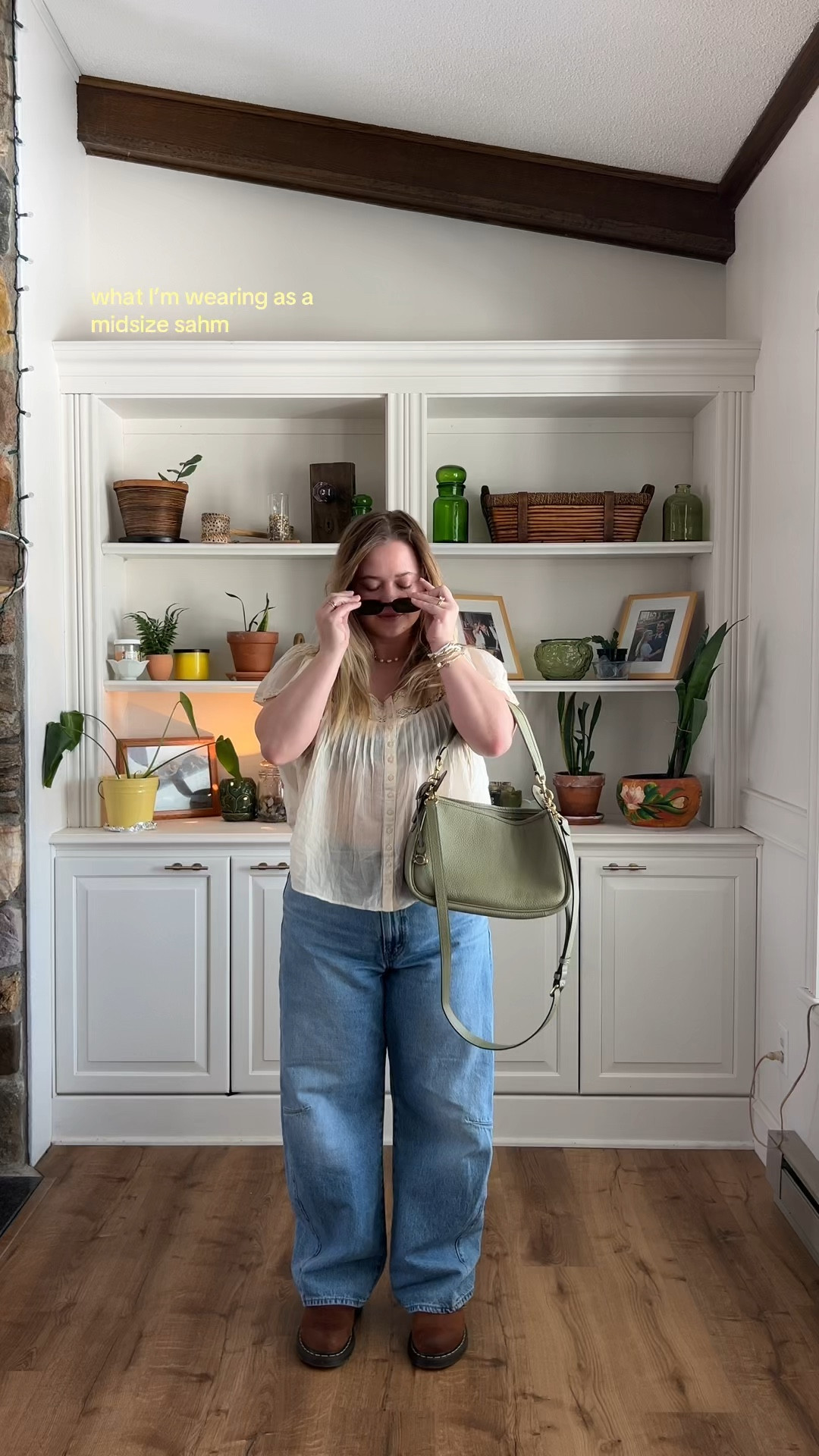 Not to freak anyone out but the temperate is above 50 today!!!!!!!!!! Crying tears of joy 🥹 

@Levi’s @Coach @Free People  @Dr. Martens 

#whatimwearing #ootd #outfit #blouse #barreljeans 

Barrel jeans outfit 
Levi’s jeans 
Cinch baggy 
Blouse 
Lace blouse 
Free people blouse 
Coach carry bag 
Coach bag 
Dr. Martens outfit 

#LTKootd #LTKSaleAlert #LTKMidsize