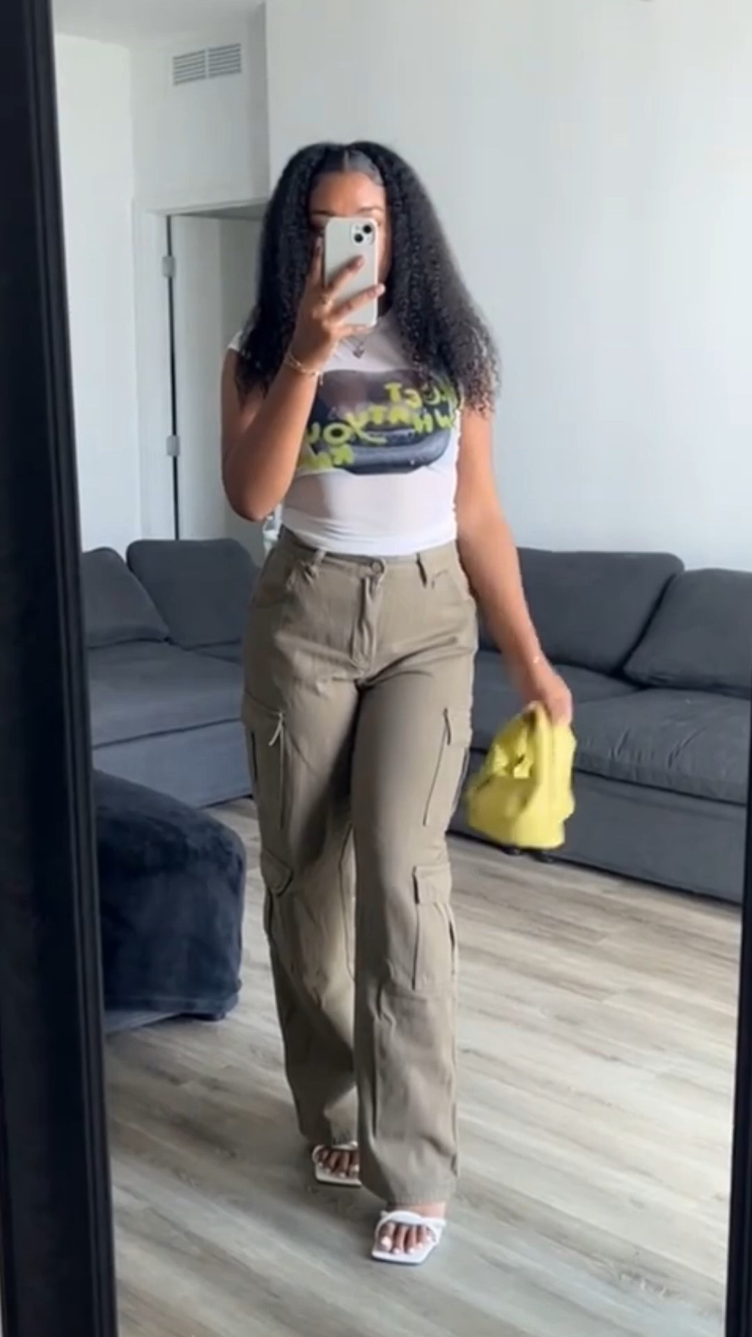 Street style with a fun pop of color 💚
Wearing a white mesh graphic tee styled with olive green cargo pants for an effortless streetwear vibe. Finished the look with white heels and a lime green mini purse to add a bold, playful touch.
Perfect for concerts, basketball games, nights out, or anywhere you want a cool but comfortable outfit. Everything linked on LTK & true to size ✨ 

 

#LTKootd #LTKSeasonal #LTKFindsUnder100