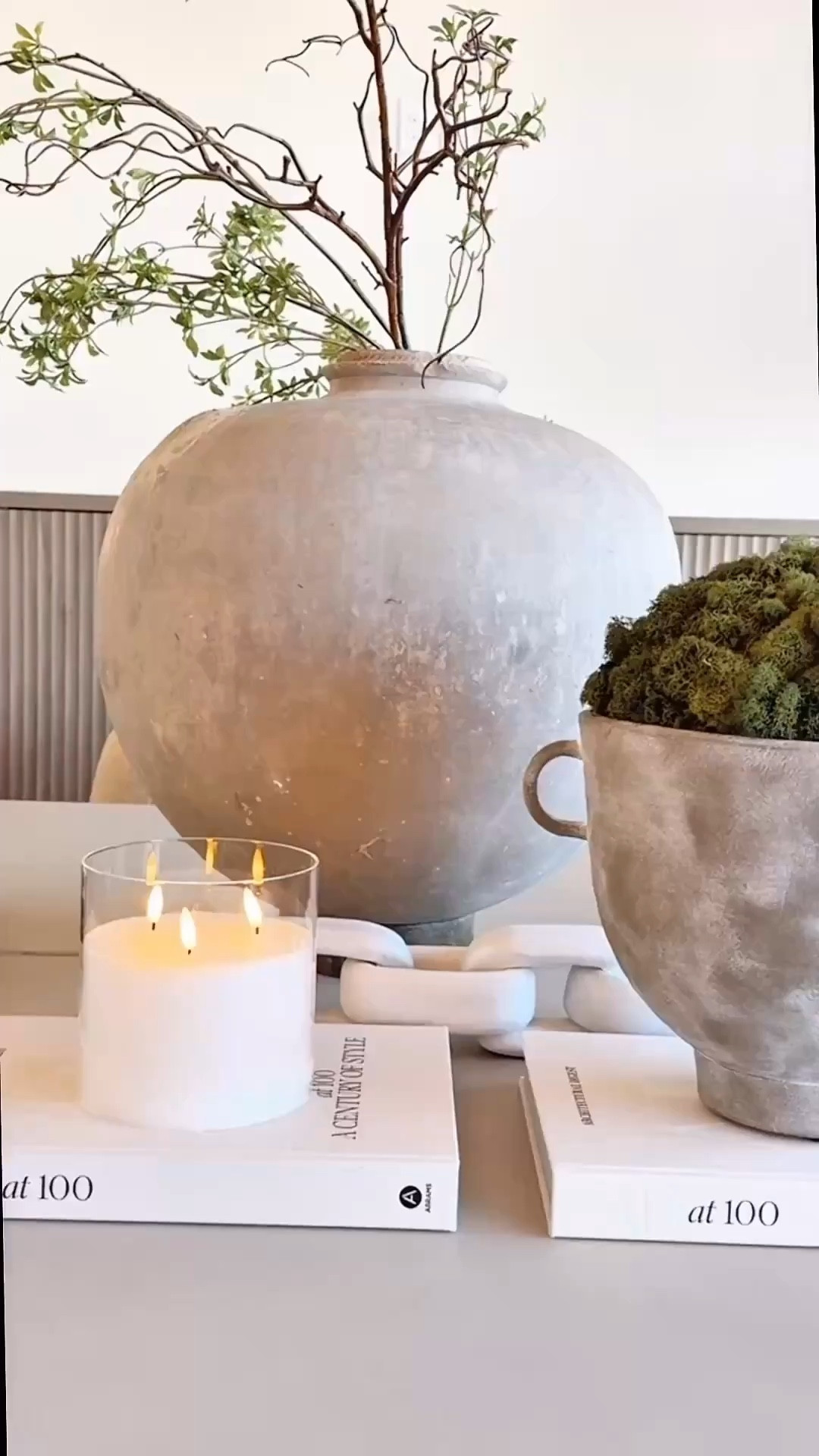 Neutral coffee table styling that is stunning and simple! 

RH Inspired Greenery. DIY faux greenery. Flameless candle. Coffee table books. Marble chain links. Ceramics. Vase. Look for less. Neutral home 


#summerthompsonstyles


#LTKdayinmylife #LTKHome