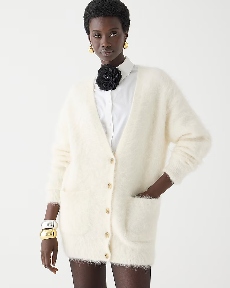 newRelaxed V-neck cardigan sweater in brushed yarn$218.00IvorySelect A SizeSize & Fit Information... | J. Crew US