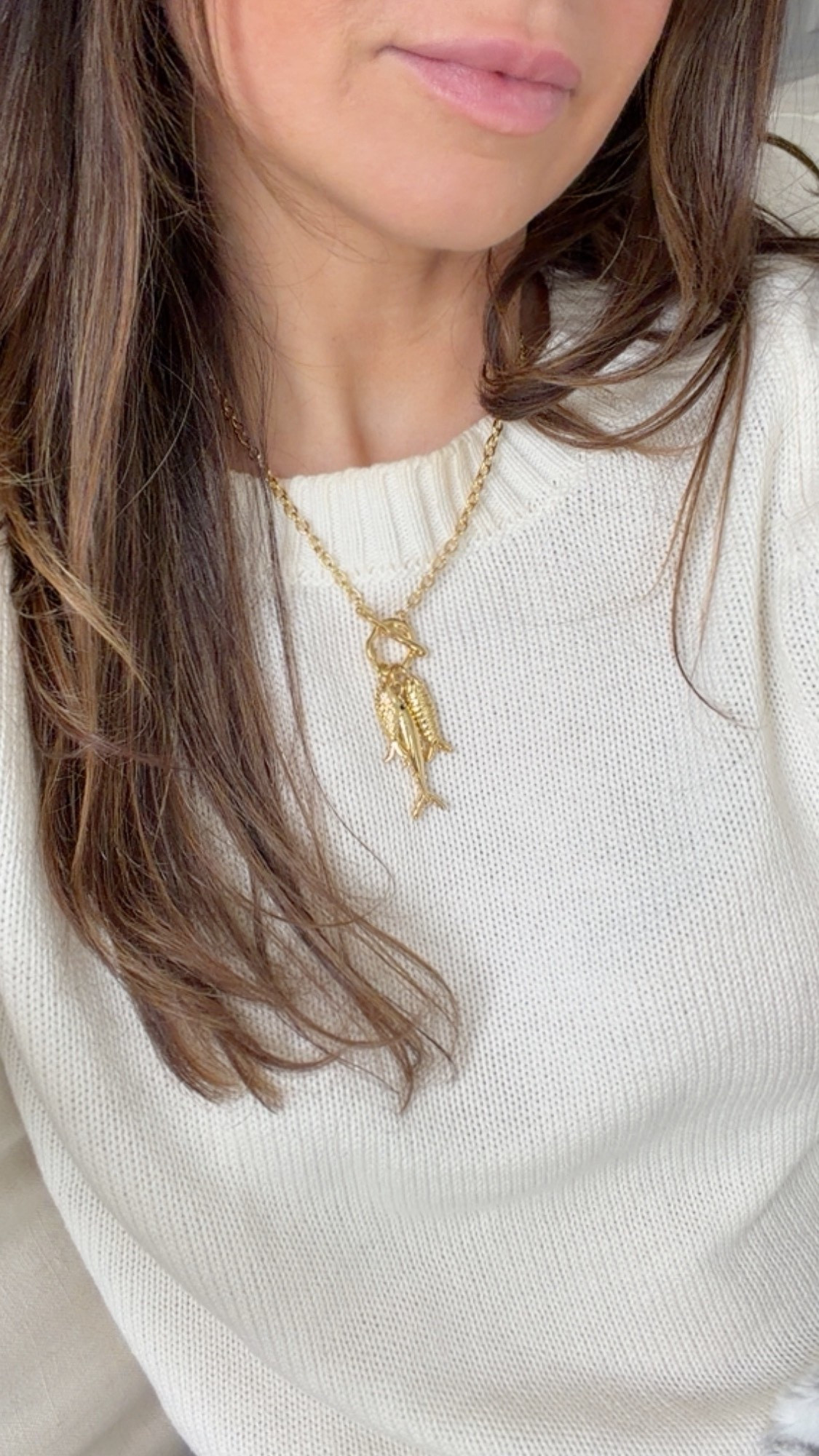 Gold fish necklace. I’m linking one similar to mine since mine’s not available online. The one I linked it’s actually less money than what I spent on mine.

#LTKootd