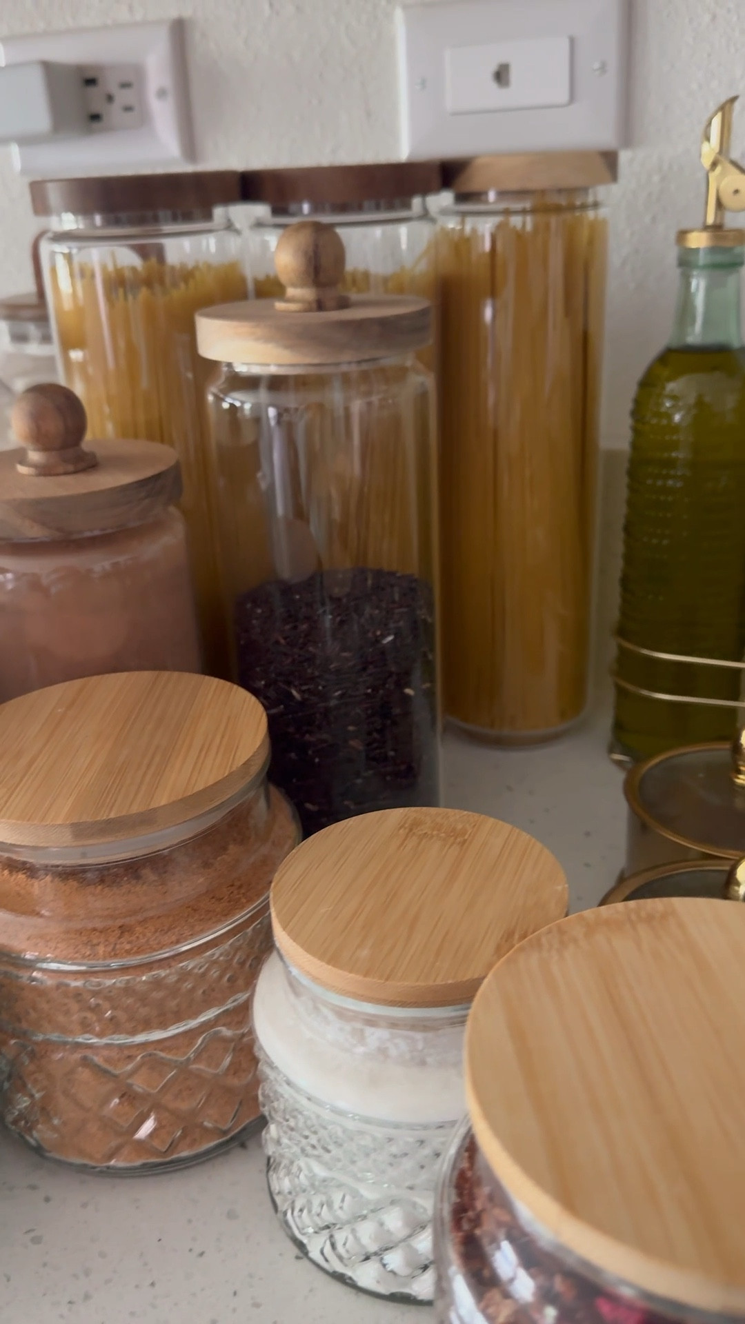 Any guesses when our next House project is going to be?
I am in all or nothing person, so for the past nine months, our pantry has been a dumping ground for baking supplies and snacks. Even our spices were just sitting in a cardboard box. I love all of these glass jars with wooden lens. They’re the perfect Set up for pantry organization. I even got new spice holders. What really sold me was the wooden spice display rack? It’s elevated in height and looks gorgeous. I looked at so many olive oil decanters in this that was by far my favorite.

#LTKHome #LTKFindsUnder50 #LTKFamily