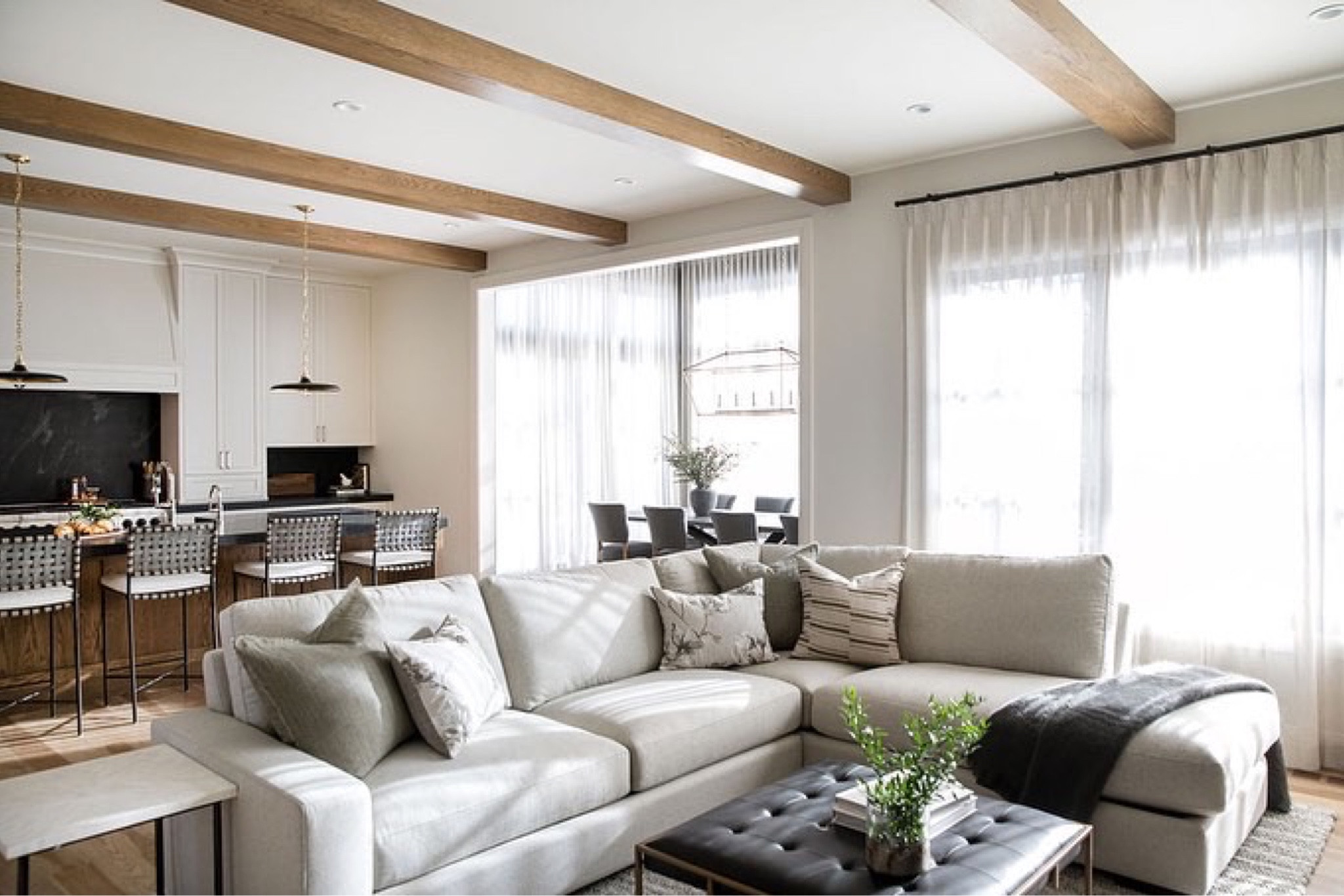 Looking for living room goals inspiration??? This beautiful space we recently completed for a client has it all! A cozy sectional, massive ottoman you can put your feet up on and all the pretty pillow layers!

#LTKhome #LTKHoliday #LTKSeasonal