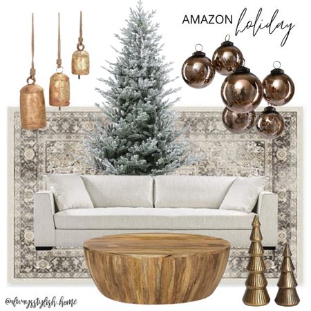 Christmas living room, Amazon living room, white couch, white sofa, wood drum coffee table, bronze ornaments, gold Christmas bells, flocked Christmas tree, gold Christmas tree decor, ruggable rug, holiday decor 

#LTKHoliday #LTKhome