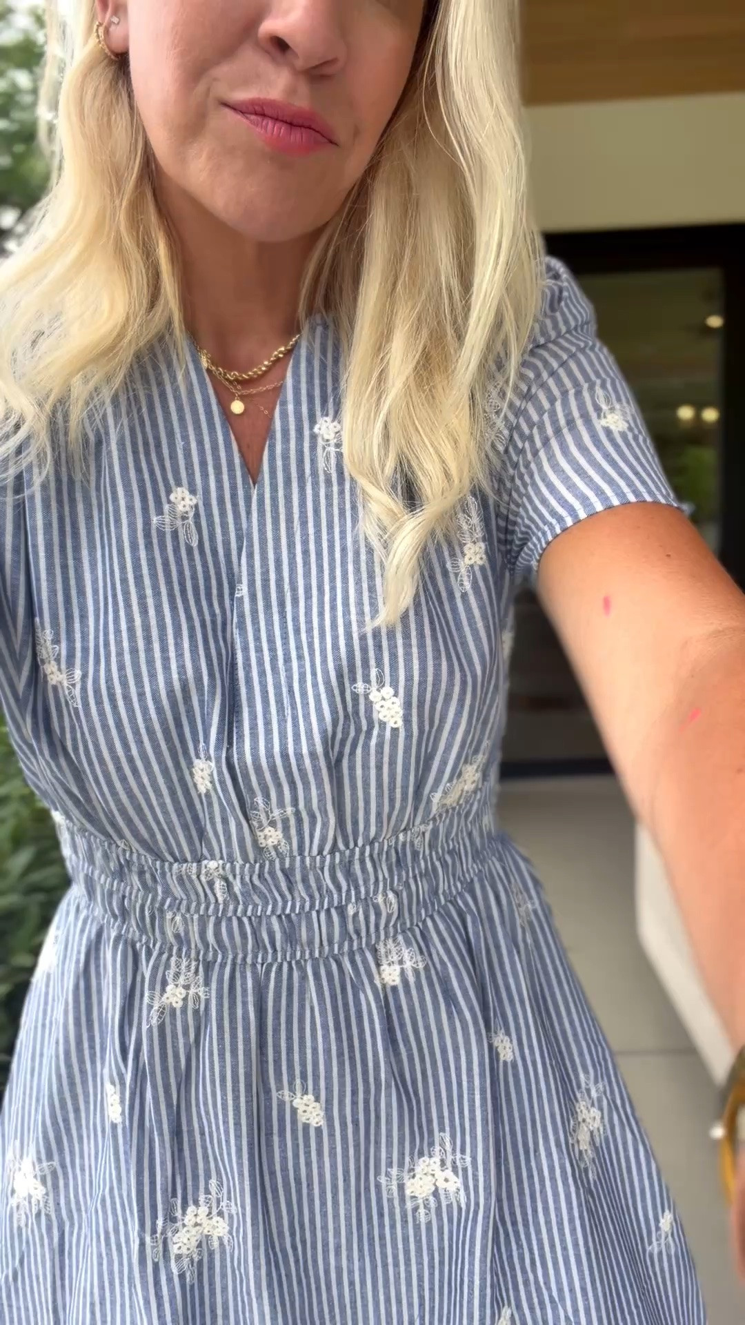 Love the fit and embroidered flower on this dress!