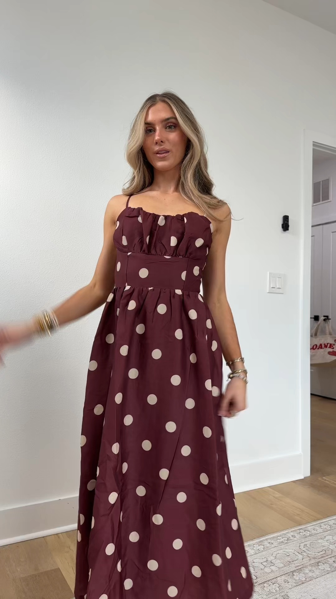 Lady black tie dresses! I’m wearing them in the smallest size I’m 5’4. 

This sophisticated burgundy midi dress features a chic polka dot print and a woven fabric. It highlights a straight neckline with slender straps, a fitted shirred bodice, a wide waistband, and a gracefully flowing skirt, secured with a back zipper closure.

#LTKootd #LTKFindsUnder100 #LTKHoliday
