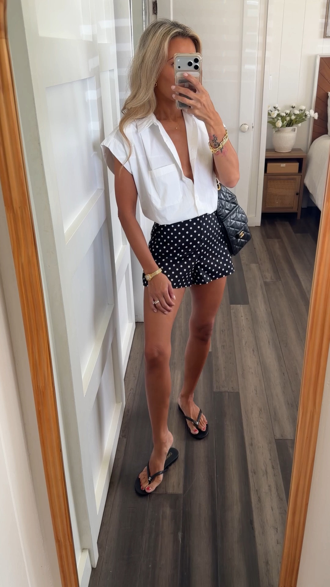 Polka dot shorts (pictured as plain white in link but when you click, the option will appear!) in xs, top is cxs. Chanel25 + sandals. 

#LTKmomlife #LTKPetite #LTKSeasonal