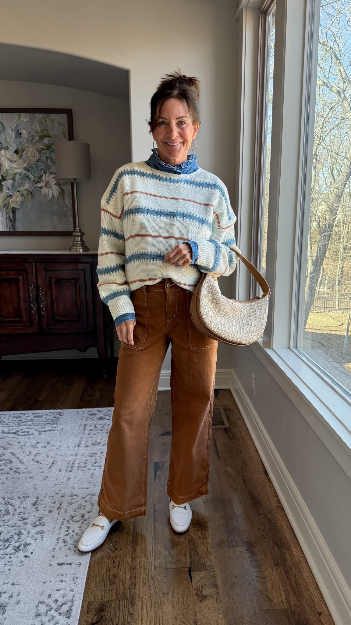 A cozy everyday look with structure. The stripes add visual interest while the straight-leg pants keep it modern.