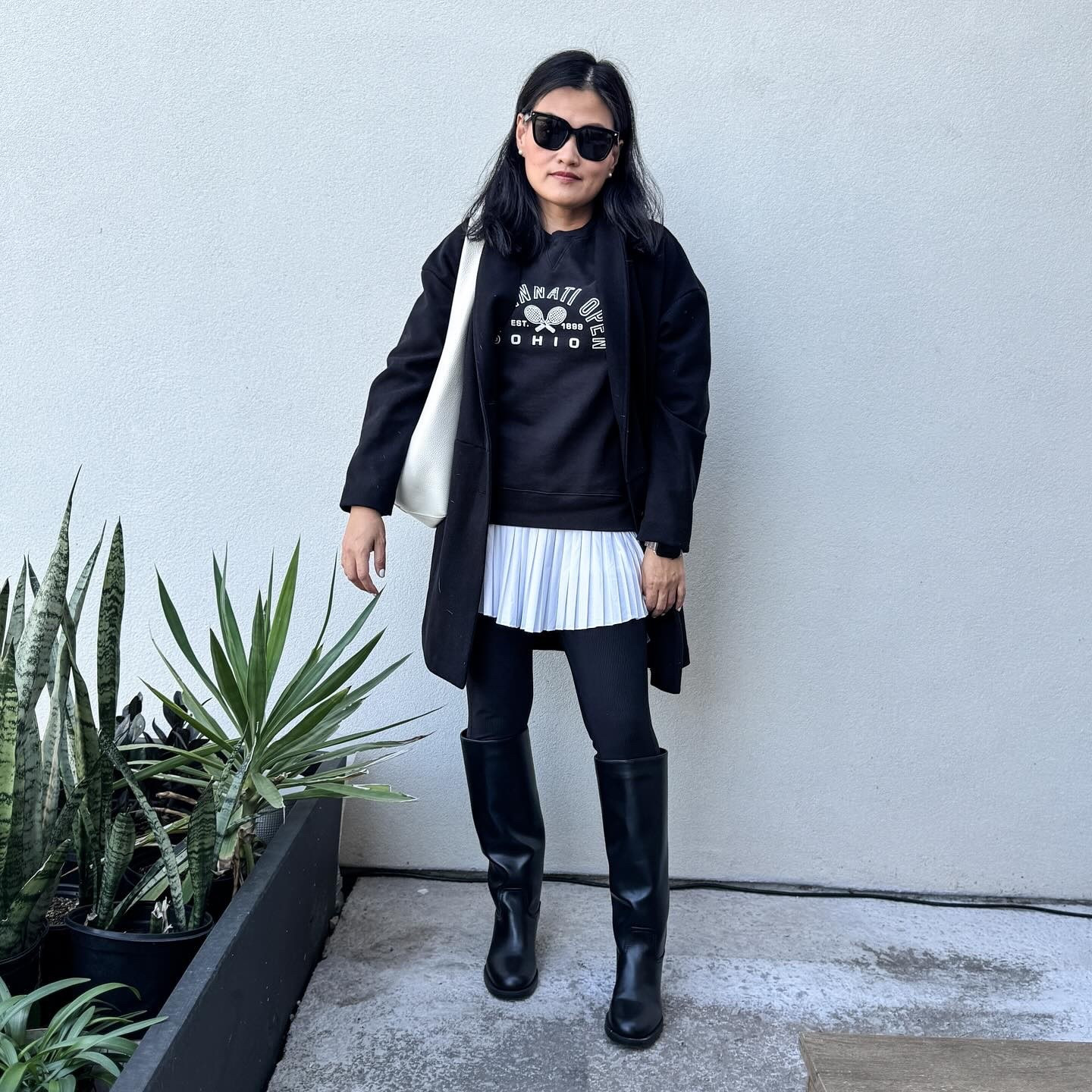 It was 40s, so I grabbed a sweater and layered it up. Lol! We took the mini to the Cincinnati Open in the summer before she went back to school … and I ended up getting this sweater as a souvenir. 😊
