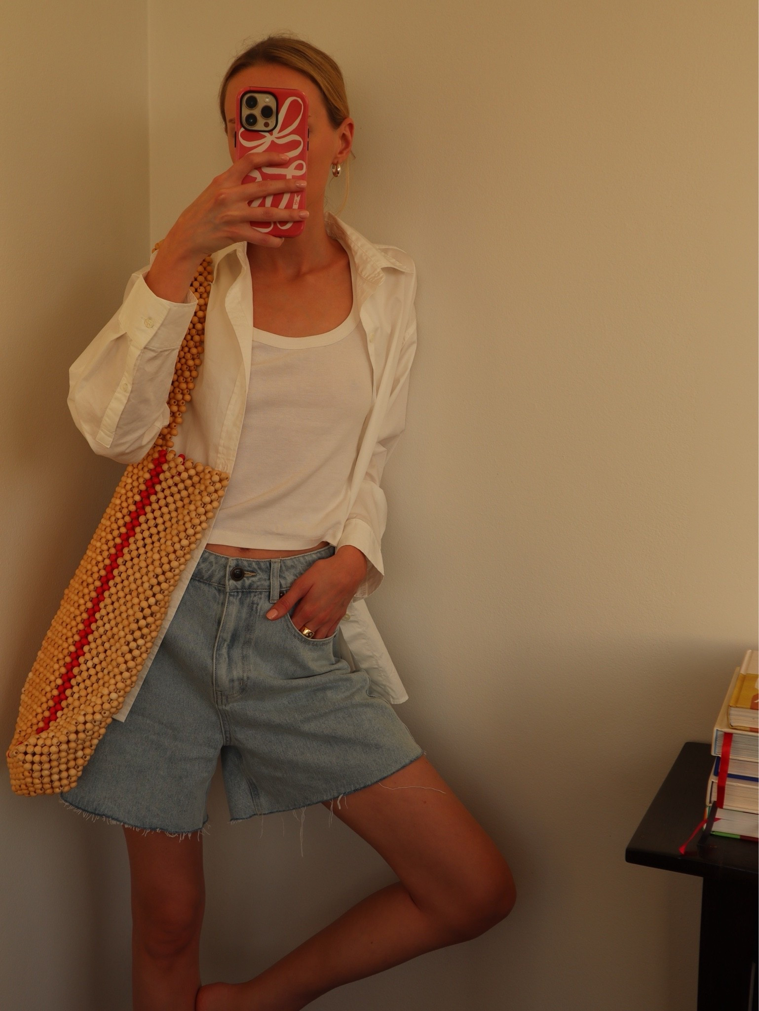 Denim shorts, the perfect tank and a classic white shirt - chefs kiss.

#LTKsummer #LTKaustralia #LTKspring