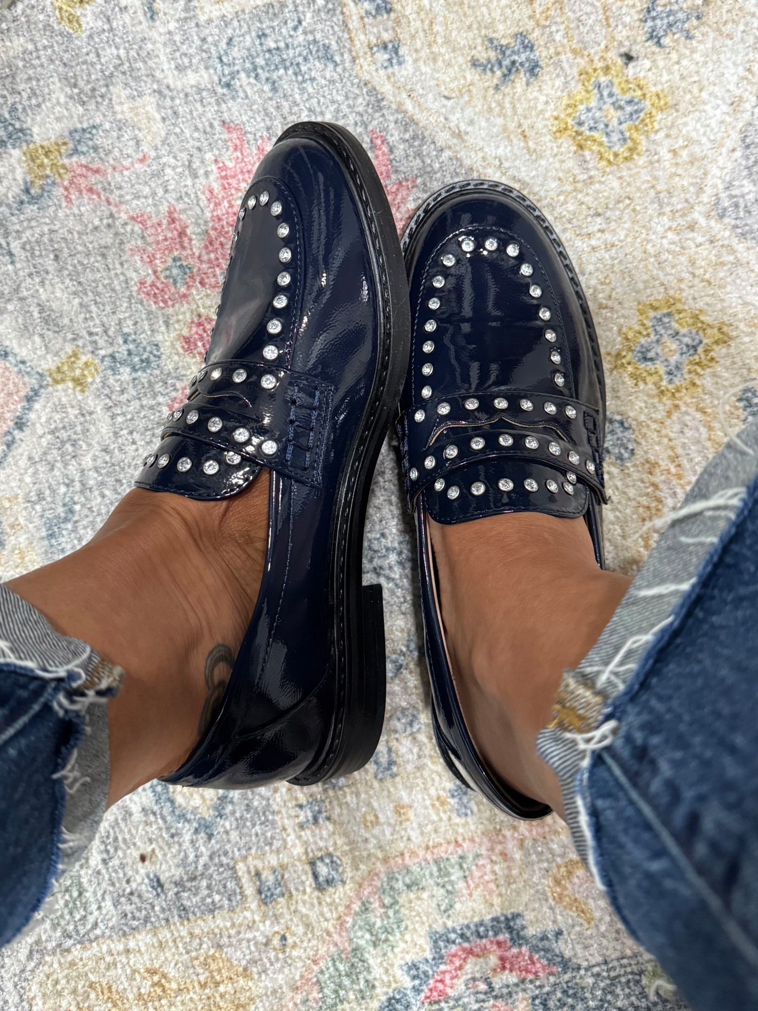 I love these Loafers SO MUCH! 
The patent leather combined with the studs makes it edgy play on a classic shoe. 

I got Navy, but they’re available in black and brown as well. 

They fit tts. 

Fall shoe drop, fall shoes, 

#LTKFindsUnder50 #LTKShoeCrush #LTKStyleTip