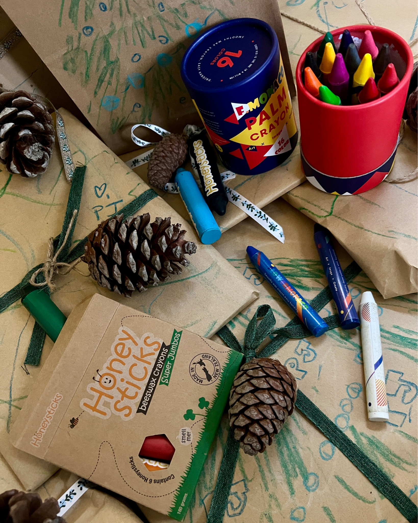 DIY gift wrapping idea: use non toxic crayons on craft paper to trace your kinds hands and feet and let them scribble away  

#LTKHoliday