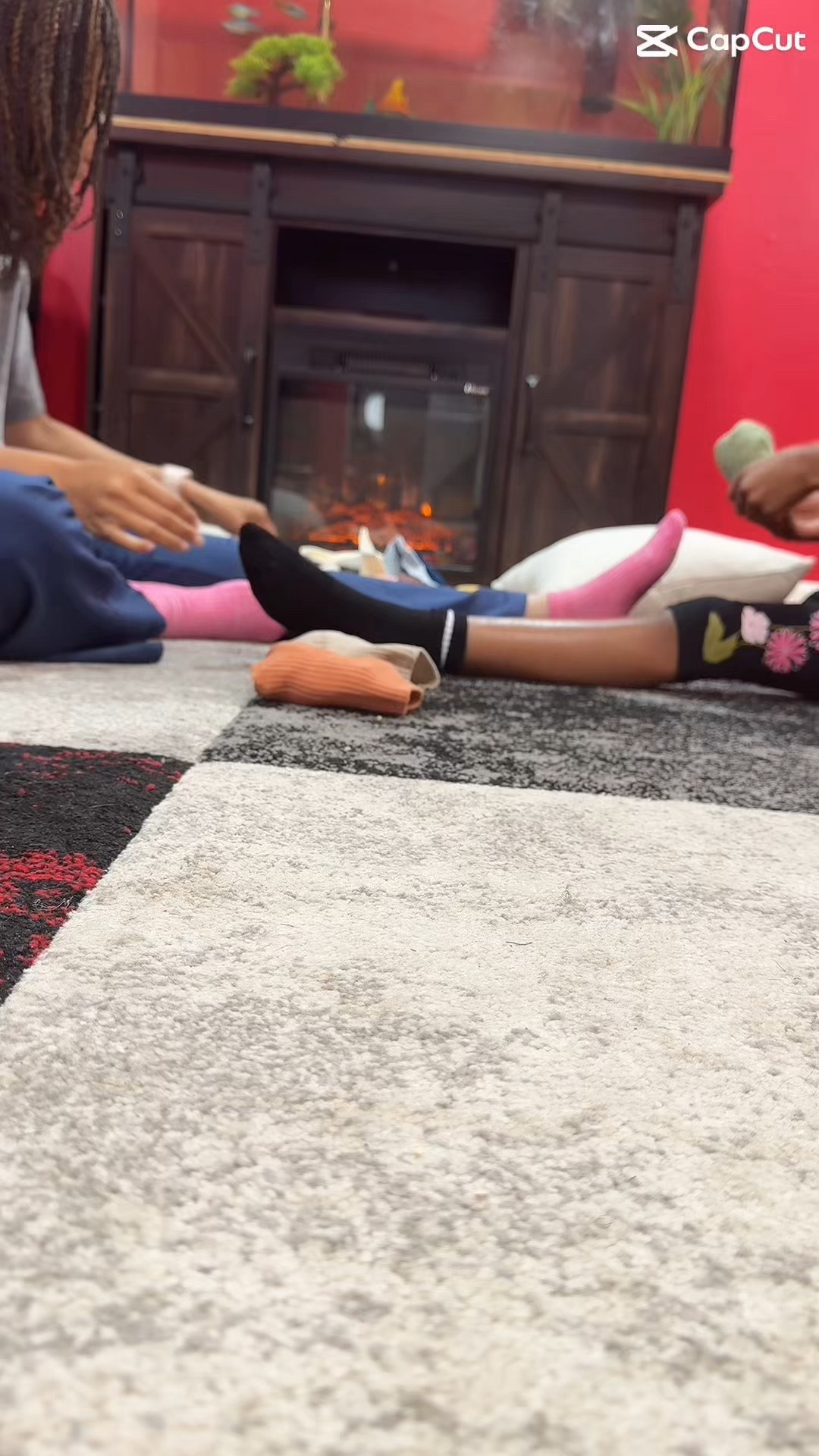 Self-Reflection Sunday vibes 🧦✨  
A little sock folding, a warm fire, and slow movements to reset for the week ahead.  
Sharing a few of my cozy home favorites — from the fireplace to the soft socks — in case you’re building your own peaceful corner.  
Linked in the shop 💙  
#LTKHome #LTKCozy #SelfCareSunday #SundayReset