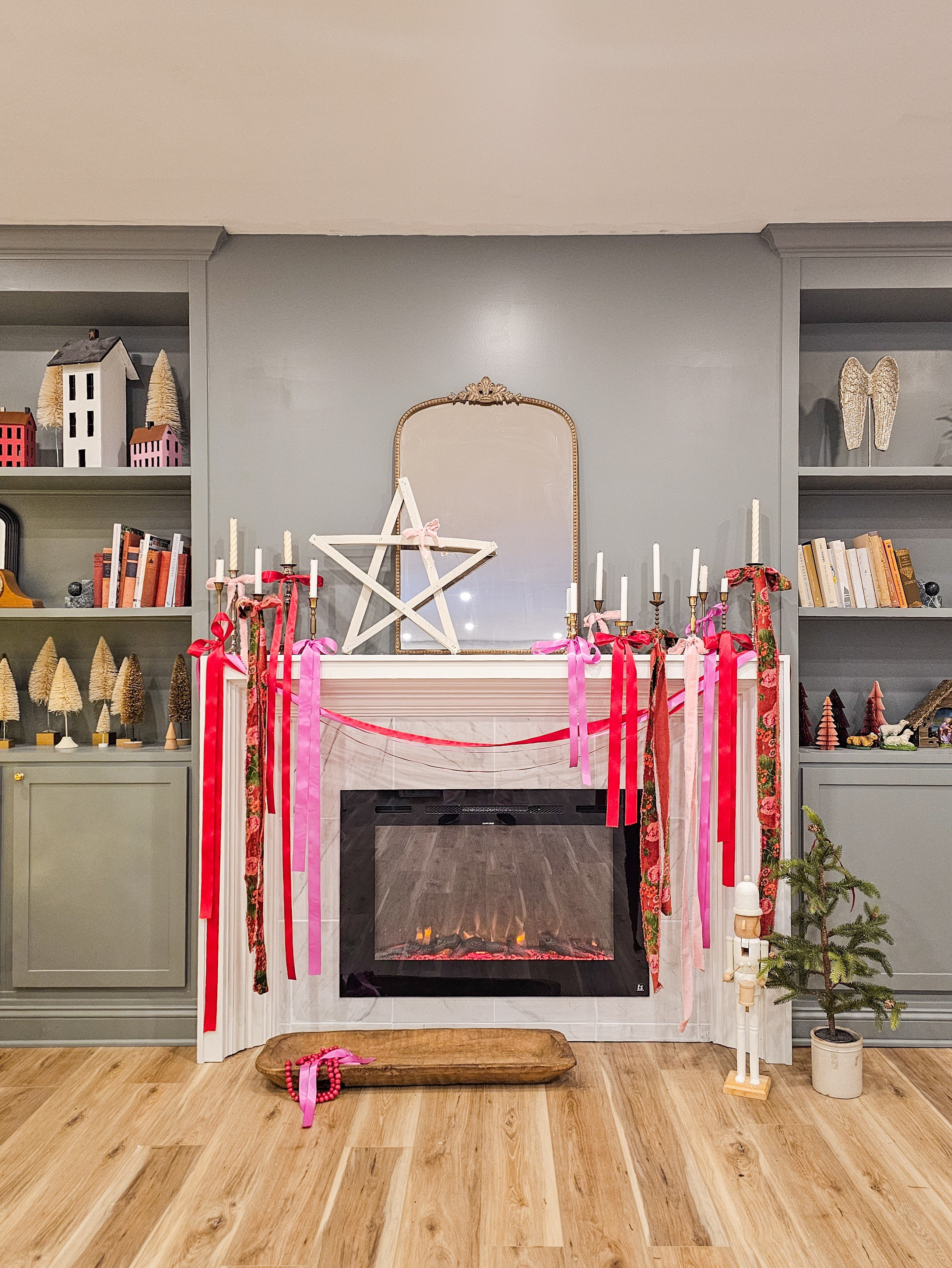 A Merry and romantic Christmas Mantel full of pink and red ribbons 

#LTKHoliday #LTKHome #LTKSeasonal