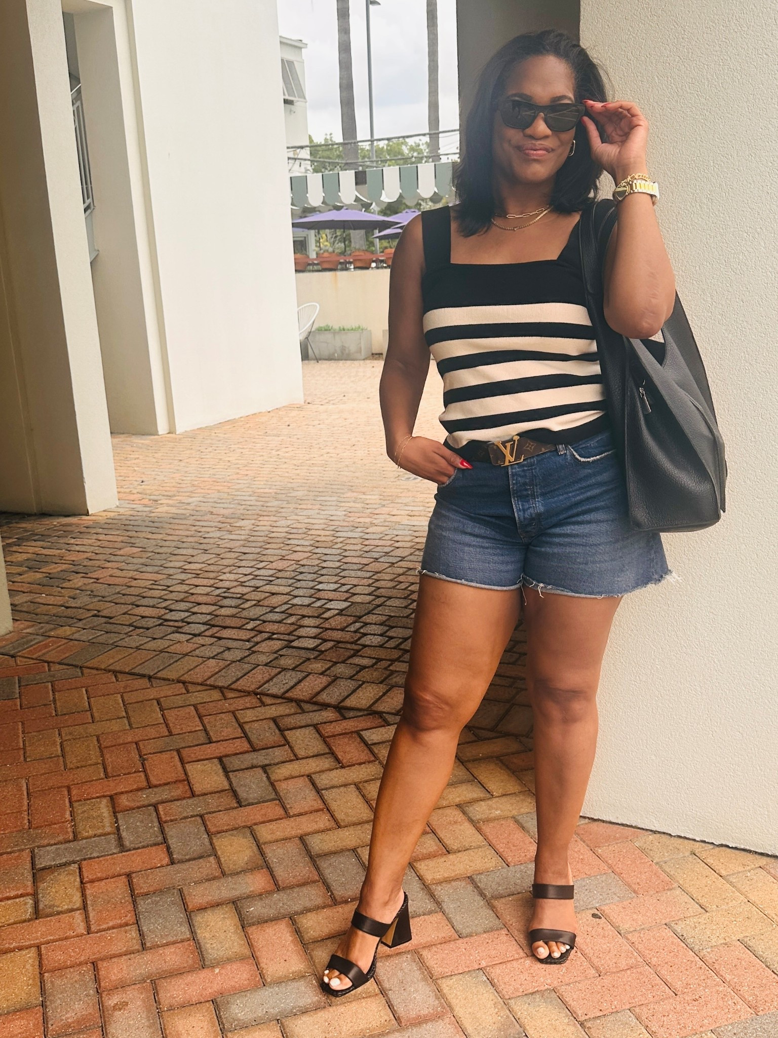 OOTD for lunch. Shorts are Abercrombie, tank is super old, sandals are Vince Camuto, and shades are Prada. 🖤 Also I linked my go to makeup items. 💄 

#LTKShoeCrush #LTKMidsize #LTKBeauty