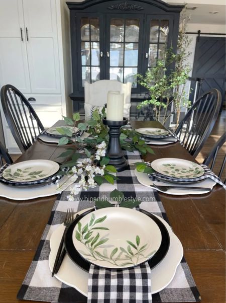 Spring tablescape inspiration with crisp black and white check table runner, napkins and black candle sticks. Add some pretty spring greenery for a final touch 

#LTKstyletip #LTKSeasonal #LTKhome