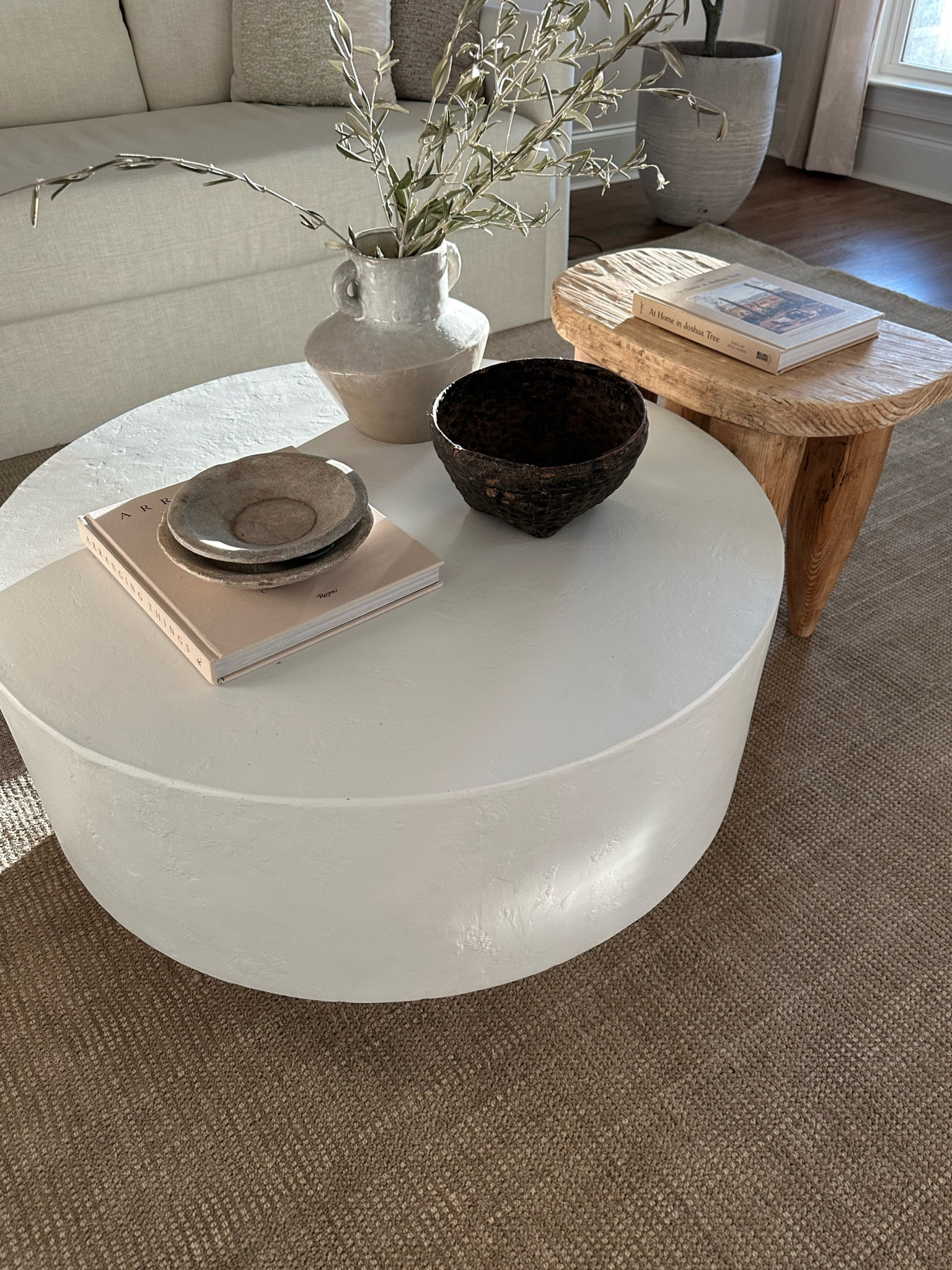 Plaster coffee table & Senufo stool

Stool/ coffee table/ coffee table styling / olive stems/ table styling / wool rug/ neutral area rug/ home decor 

#LTKU #LTKstyletip #LTKhome