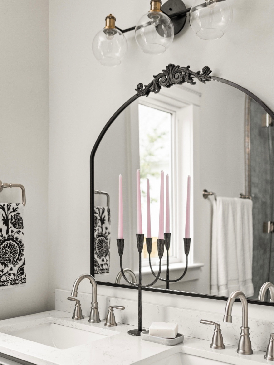 Matte black accents pair well with brushed nickel to back with bathroom feel cohesive with the moody bedroom.

#LTKhome